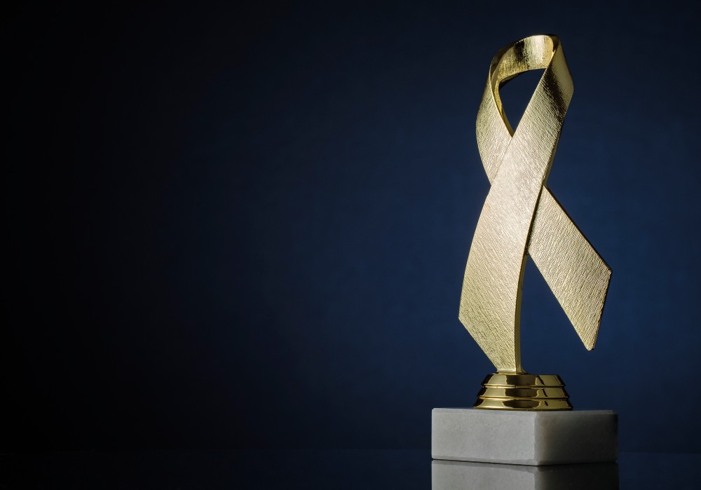 symbolic-textured-gold-ribbon-trophy-award-2026-01-06-10-54-18-utc (1)